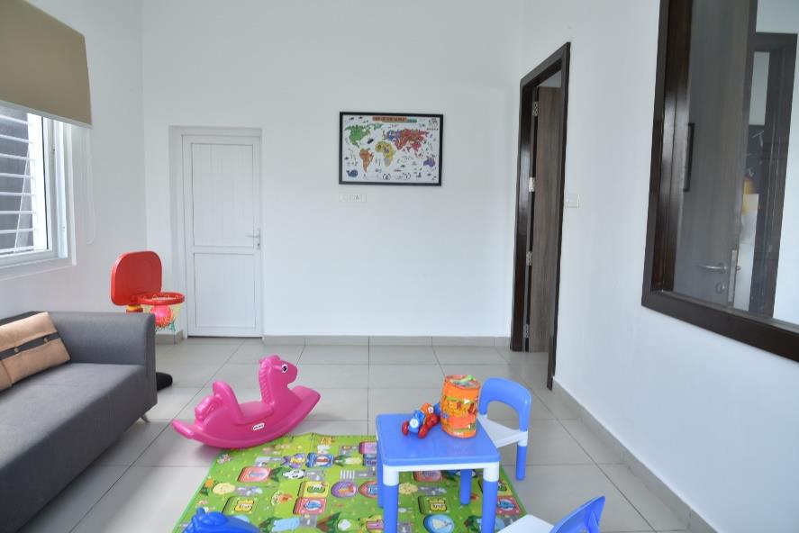 On-site creche and daycare facility with toys and play area